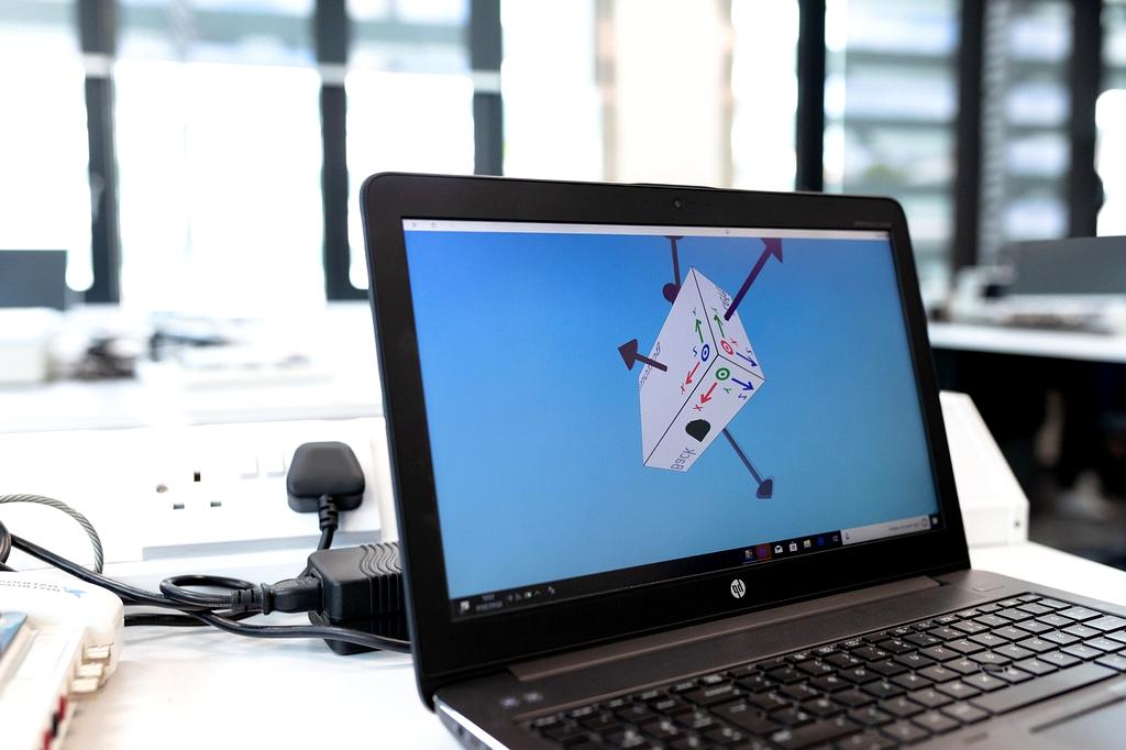 Software Engineer coding on laptop
